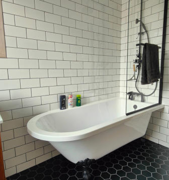 Victorian style bathroom, black hexagon floor tiles, white metro wall tiles and black fittings