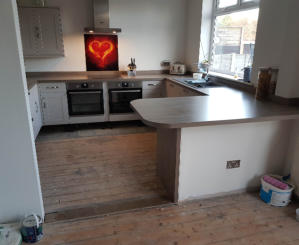 Howdens kitchen in Stockport with 2 ovens and laminate worktops