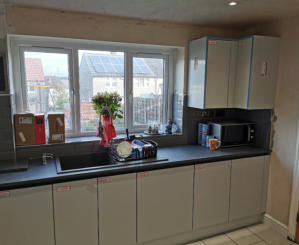 wren handleless kitchen in Ashton with compact laminate worktops