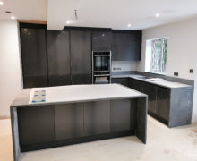 Anthracite grey kitchen in Cheadle Hlume with dark grey quartz worktops