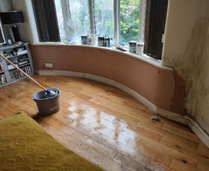 curved bay window plastered in Stockport