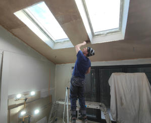 ceiling being plastered in Stockport