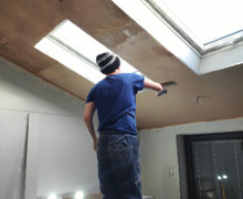 ceiling being plastered in Stockport