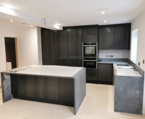 anthracite grey kitchen with dark grey quartz worktops