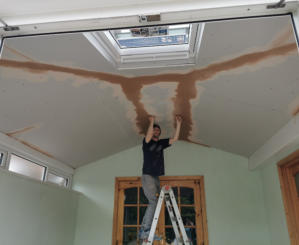 plastering a ceiling in Woodsmoor, Stockport.