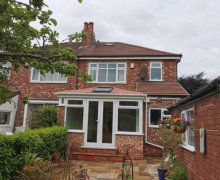 new red solid conservatory roof in Woodsmoor, Stockport