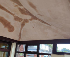 inside newly plastered ceiling of solid conservatory roof