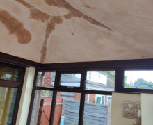 inside newly plastered ceiling of solid conservatory roof